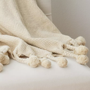 Throw pom pom crema algodon