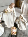 Nacimiento blanco y dorado