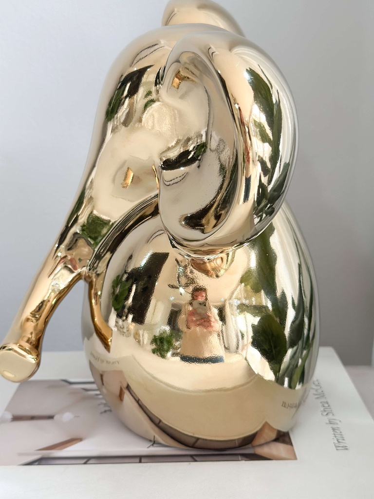 Elefante dorado de ceramica