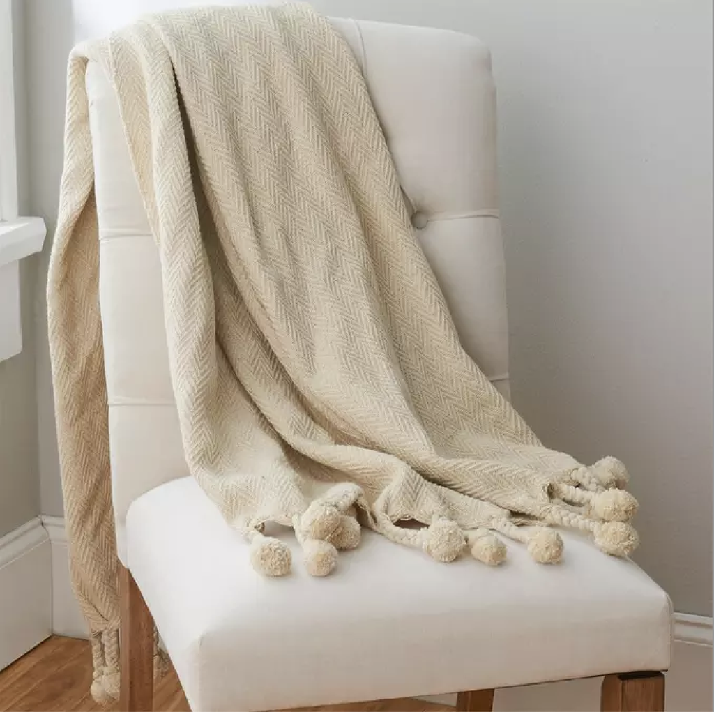Throw pom pom crema algodon